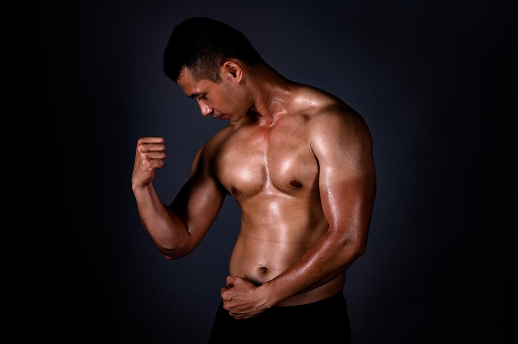 Can I buy Viagra over the counter at Boots - A strong Asian man raised his arms to show his strong and beautiful muscles from exercise